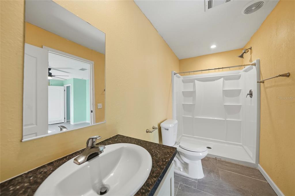 11337 Pineapple Road Punta Gorda, FL 33955 - Photo 14 of 25 a bathroom with a sink and a toilet