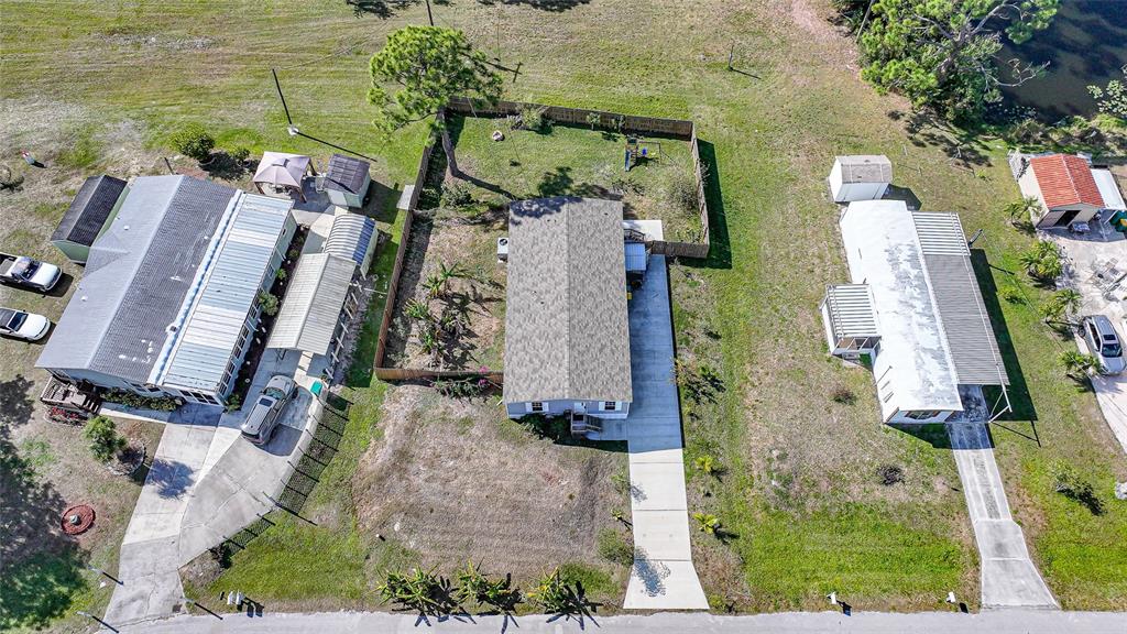11337 Pineapple Road Punta Gorda, FL 33955 - Photo 3 of 25 aerial view of a house with outdoor space