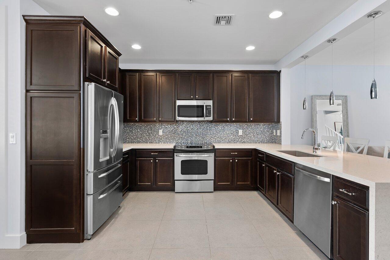 110 Southwest 1st Avenue Delray Beach, FL 33444 - Photo 11 of 48 Spacious upstairs kitchen