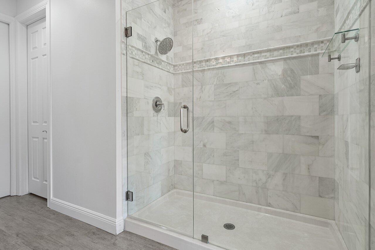 110 Southwest 1st Avenue Delray Beach, FL 33444 - Photo 27 of 48 Title to ceiling w/glass shower