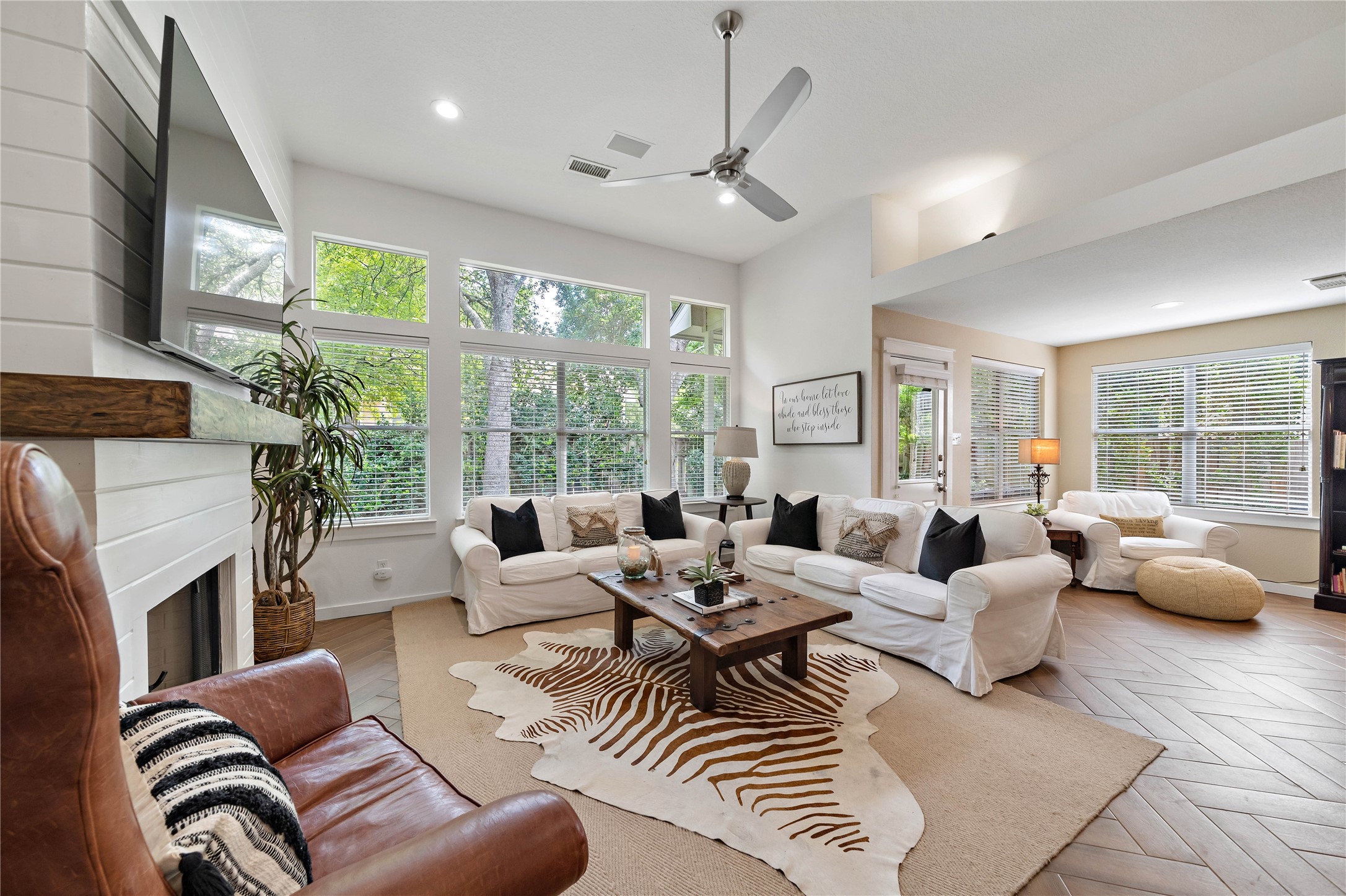 10 Vinca Trail Spring, TX 77382 - Photo 13 of 22 a living room with furniture fireplace and a large window