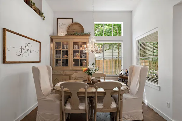 a view of a dining room with furniture window and outside view