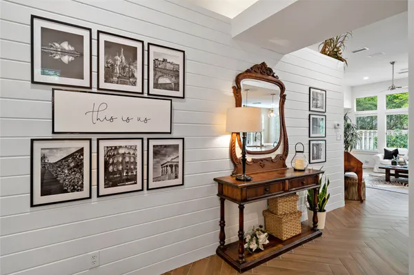 a view of an entryway with wooden floor