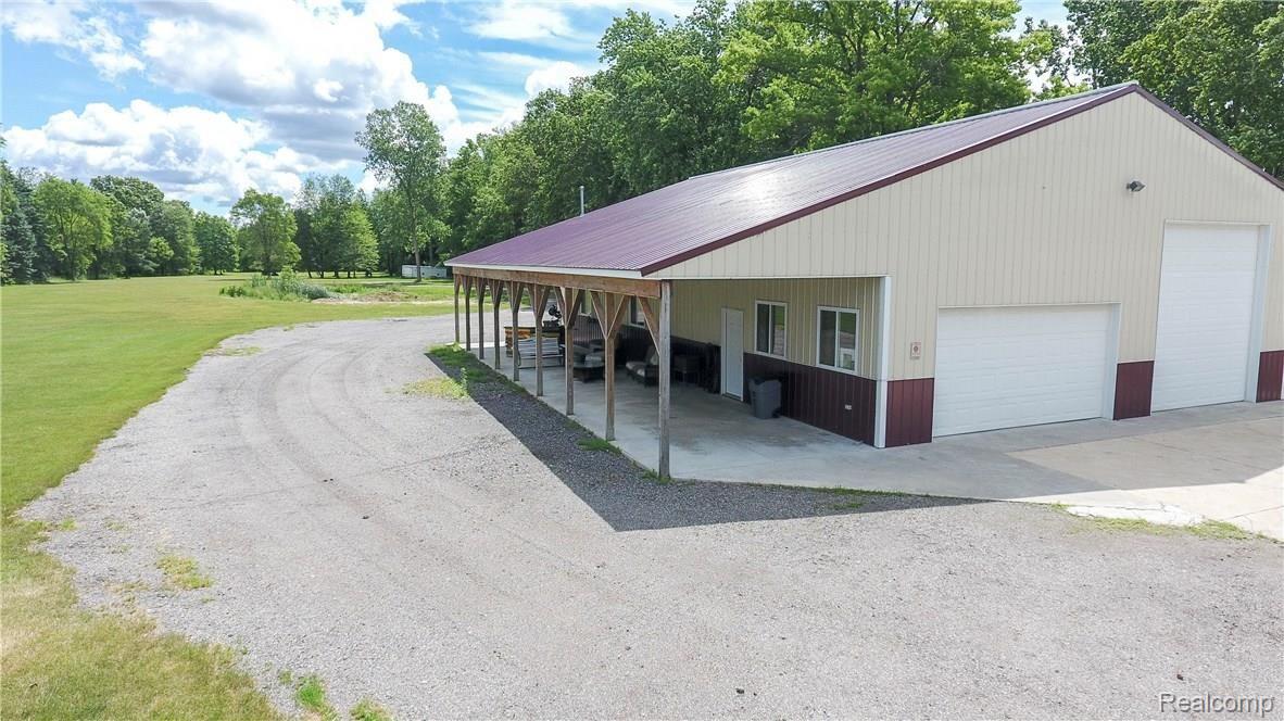 6108 Pine Knob Road Clarkston, MI 48348 - Photo 8 of 48 with a 14x64 Covered Porch
