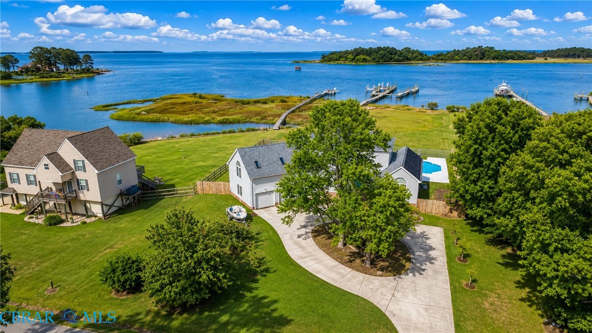 1214 Dandy Loop Road Yorktown, VA 23692 - Photo 3 of 65 a view of a lake with a garden and outdoor space