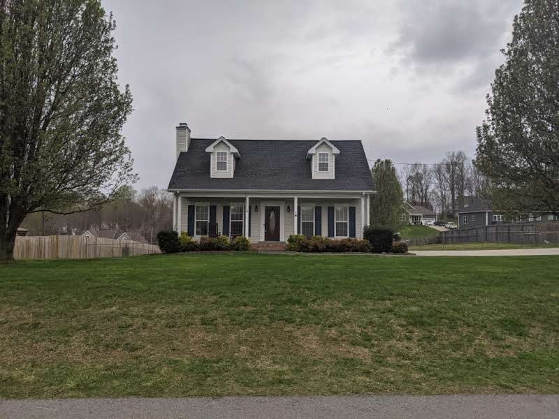 812 Blakemore Road Dickson, TN 37055 - Photo 2 of 25 a front view of house with yard and trees
