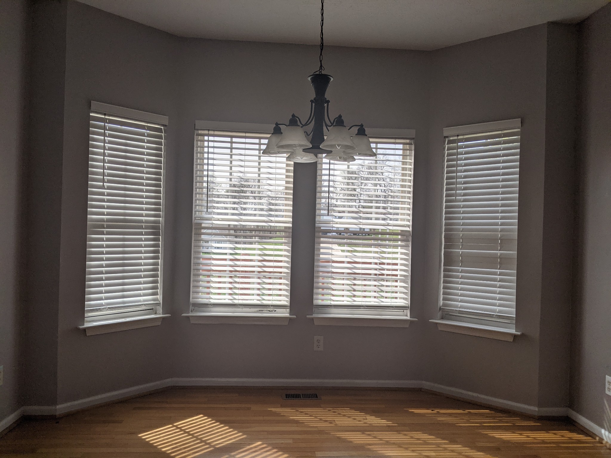 812 Blakemore Road Dickson, TN 37055 - Photo 13 of 25 a view of empty room with wooden floor and windows