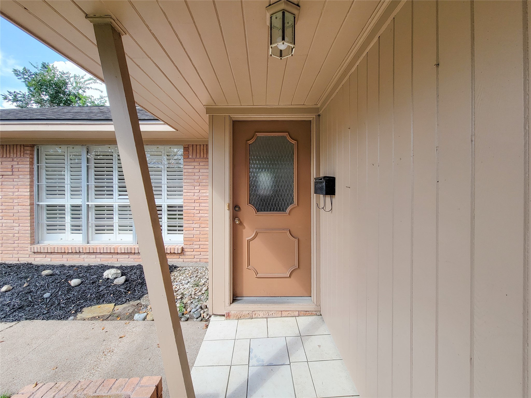 5442 Kinglet Street Houston, TX 77096 - Photo 22 of 25 a front view of a house with a porch