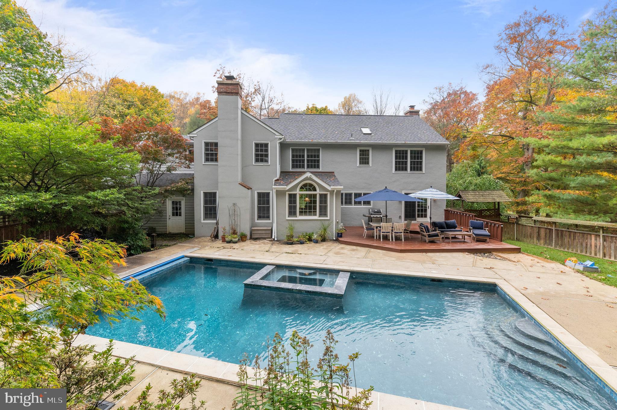 850 Hollow Road Wayne, PA 19087 - Photo 1 of 37 a view of a house with swimming pool and sitting area