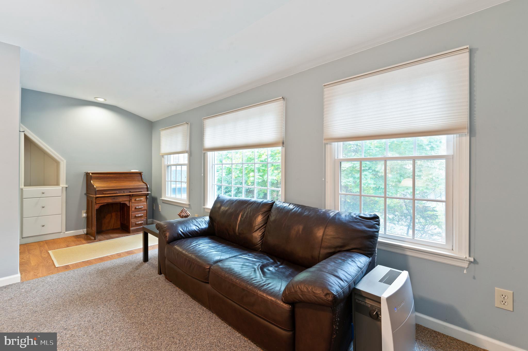 850 Hollow Road Wayne, PA 19087 - Photo 26 of 37 a living room with furniture and a fireplace