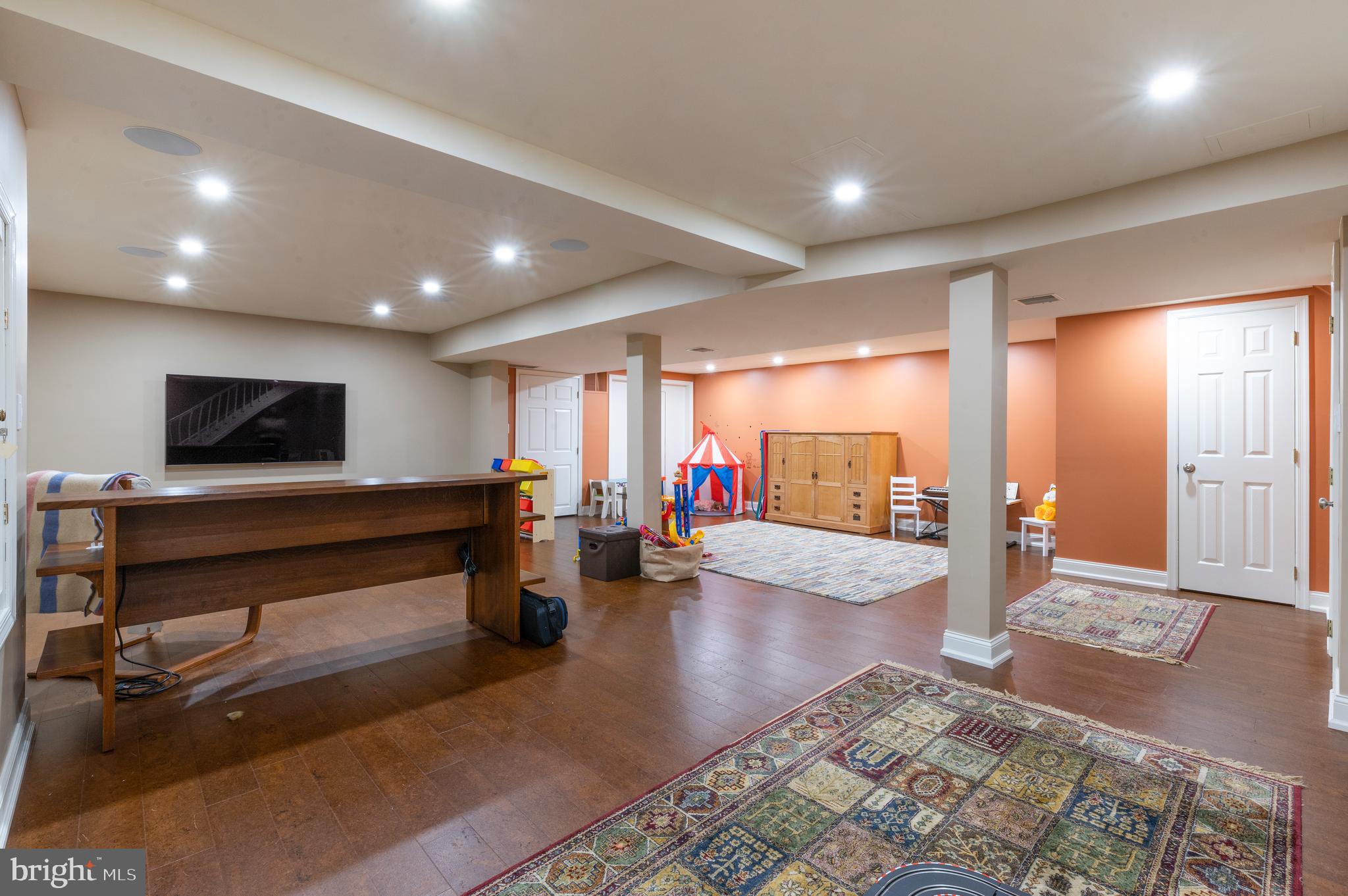 850 Hollow Road Wayne, PA 19087 - Photo 28 of 37 a living room with furniture and a flat screen tv