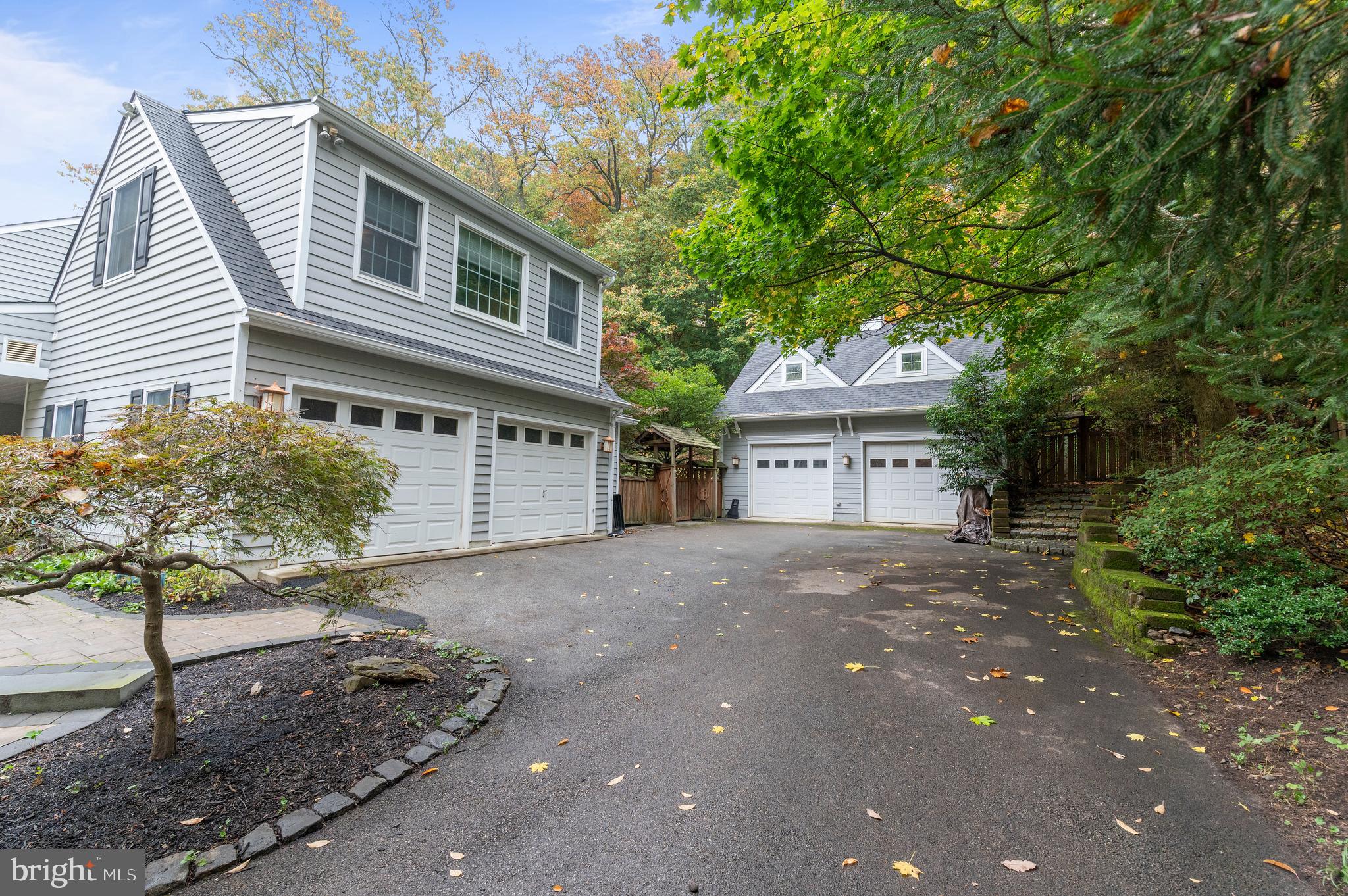 850 Hollow Road Wayne, PA 19087 - Photo 34 of 37 a front view of a house with garden