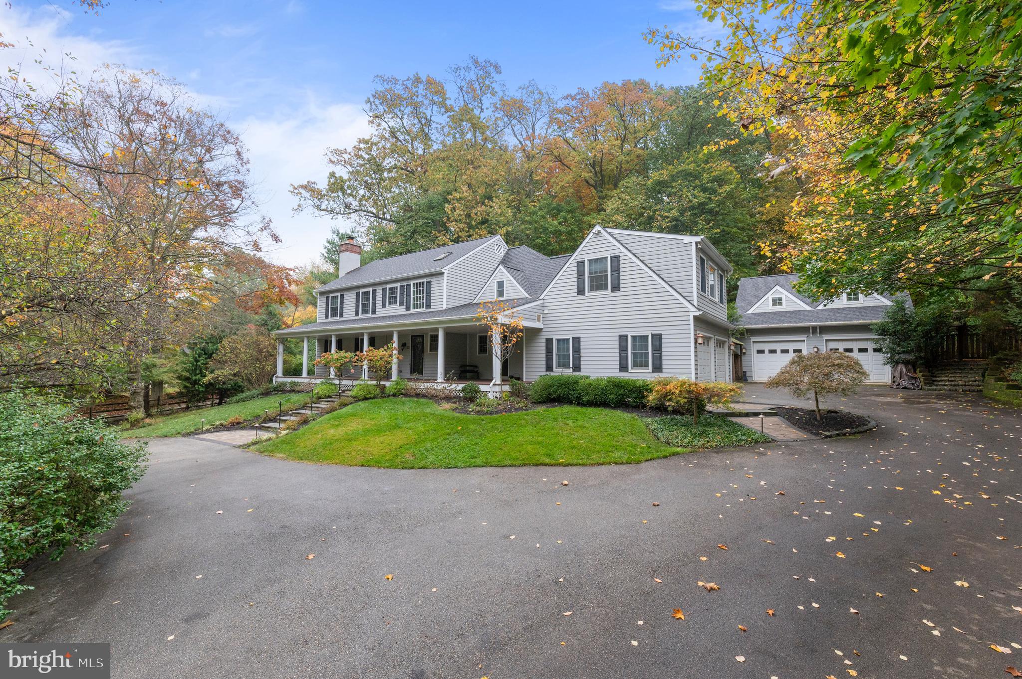 850 Hollow Road Wayne, PA 19087 - Photo 37 of 37 a front view of a house with a garden