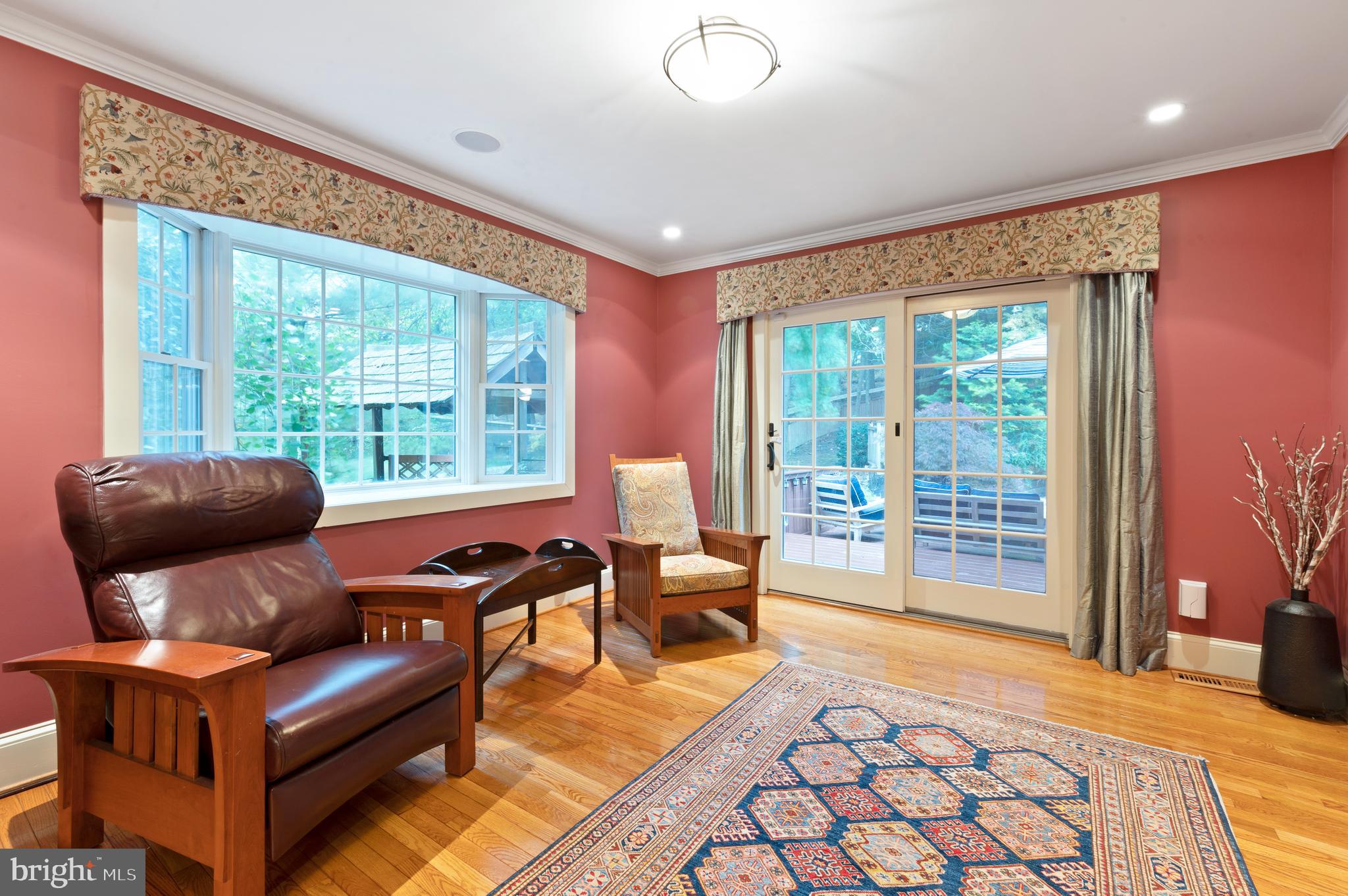 850 Hollow Road Wayne, PA 19087 - Photo 9 of 37 a living room with furniture and a floor to ceiling window