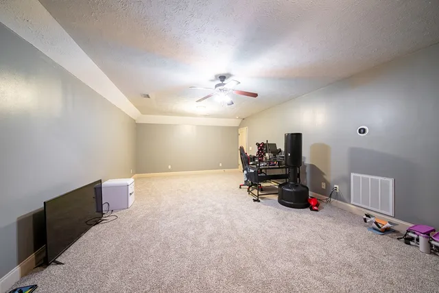a room with furniture and a chandelier