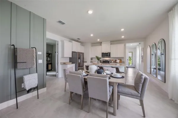 a view of a dining room with furniture