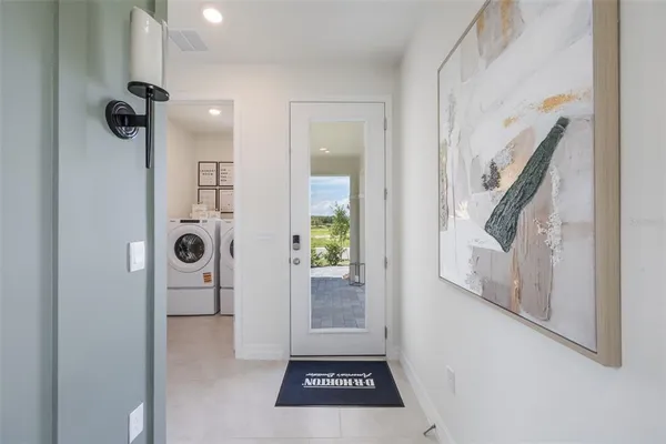 a view of entryway with bathroom