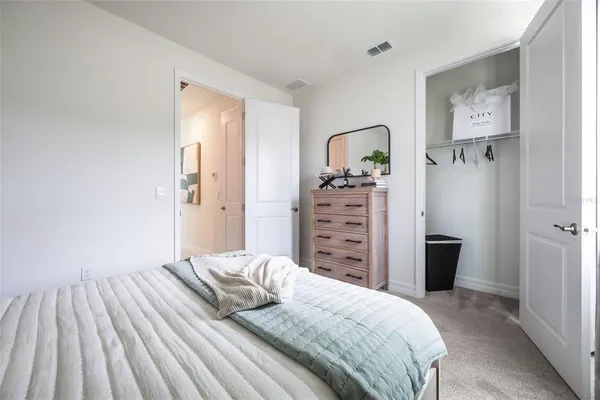 a view of a patio with swimming pool and furniture