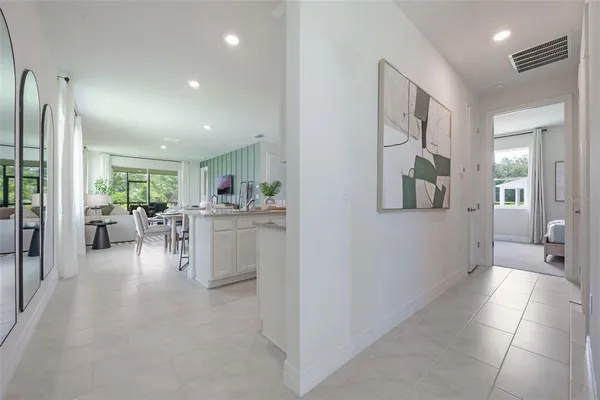 a view of a living room and dining room