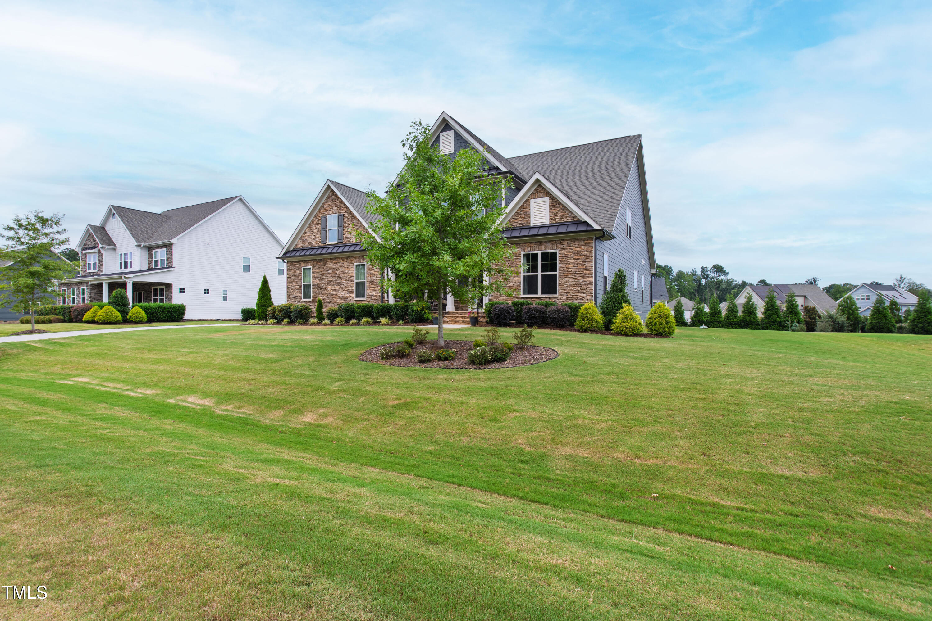 4212 Banks Stone Drive Raleigh, NC 27603 - Photo 12 of 69 a front view of house with yard and green space