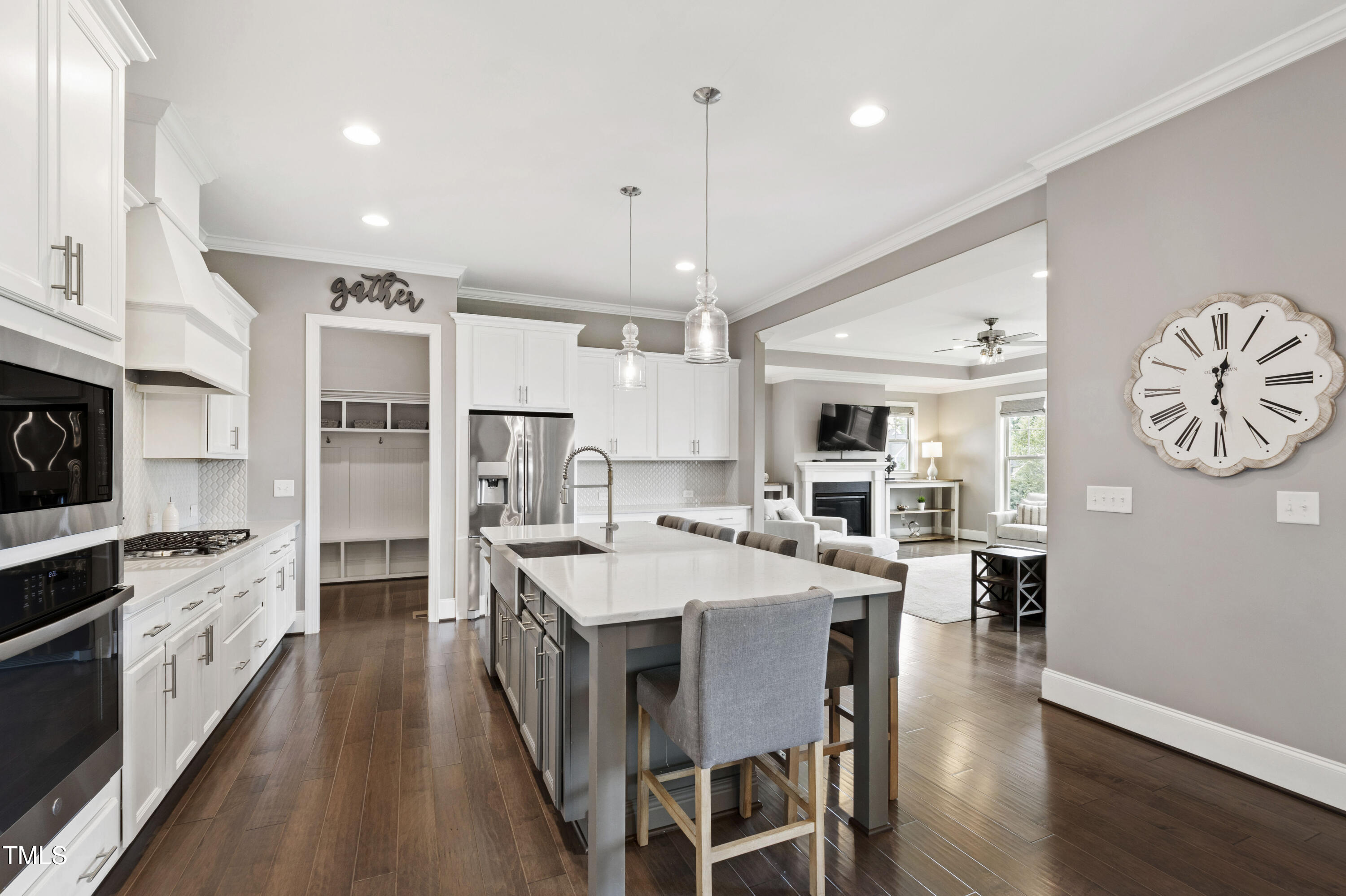4212 Banks Stone Drive Raleigh, NC 27603 - Photo 24 of 69 a large kitchen with a table and chairs