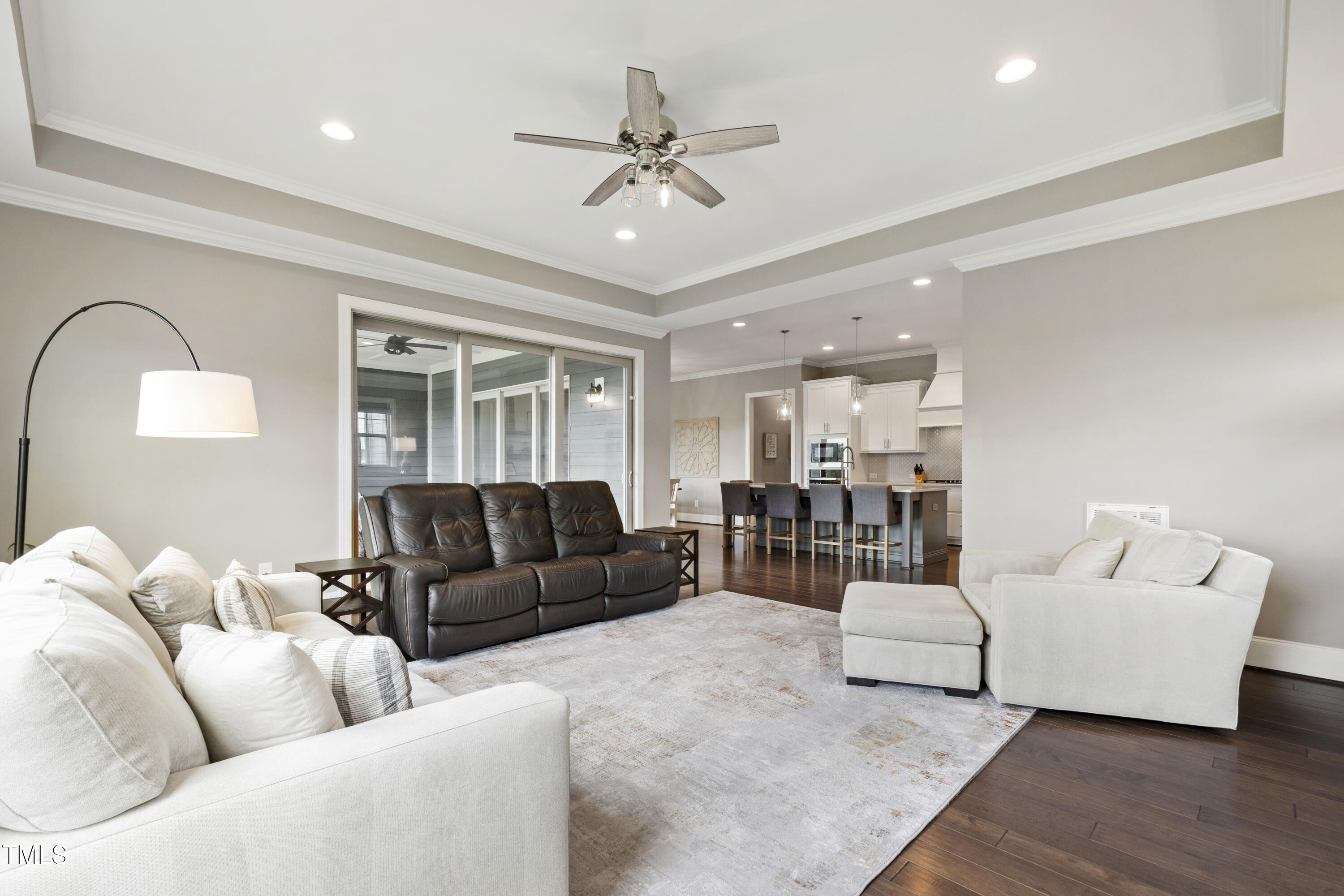 4212 Banks Stone Drive Raleigh, NC 27603 - Photo 30 of 69 a living room with furniture and a wooden floor