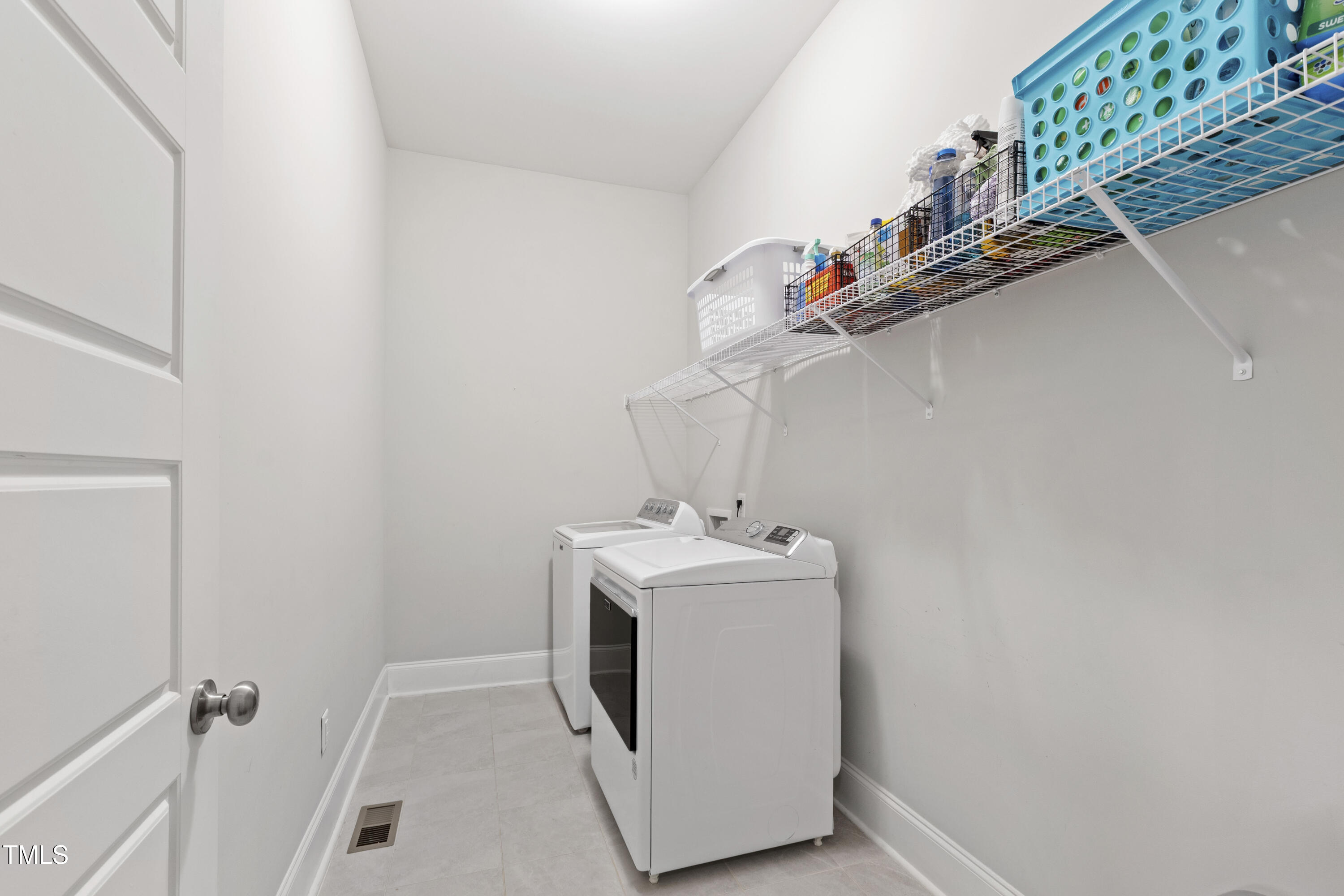4212 Banks Stone Drive Raleigh, NC 27603 - Photo 34 of 69 a utility room with dryer and washer