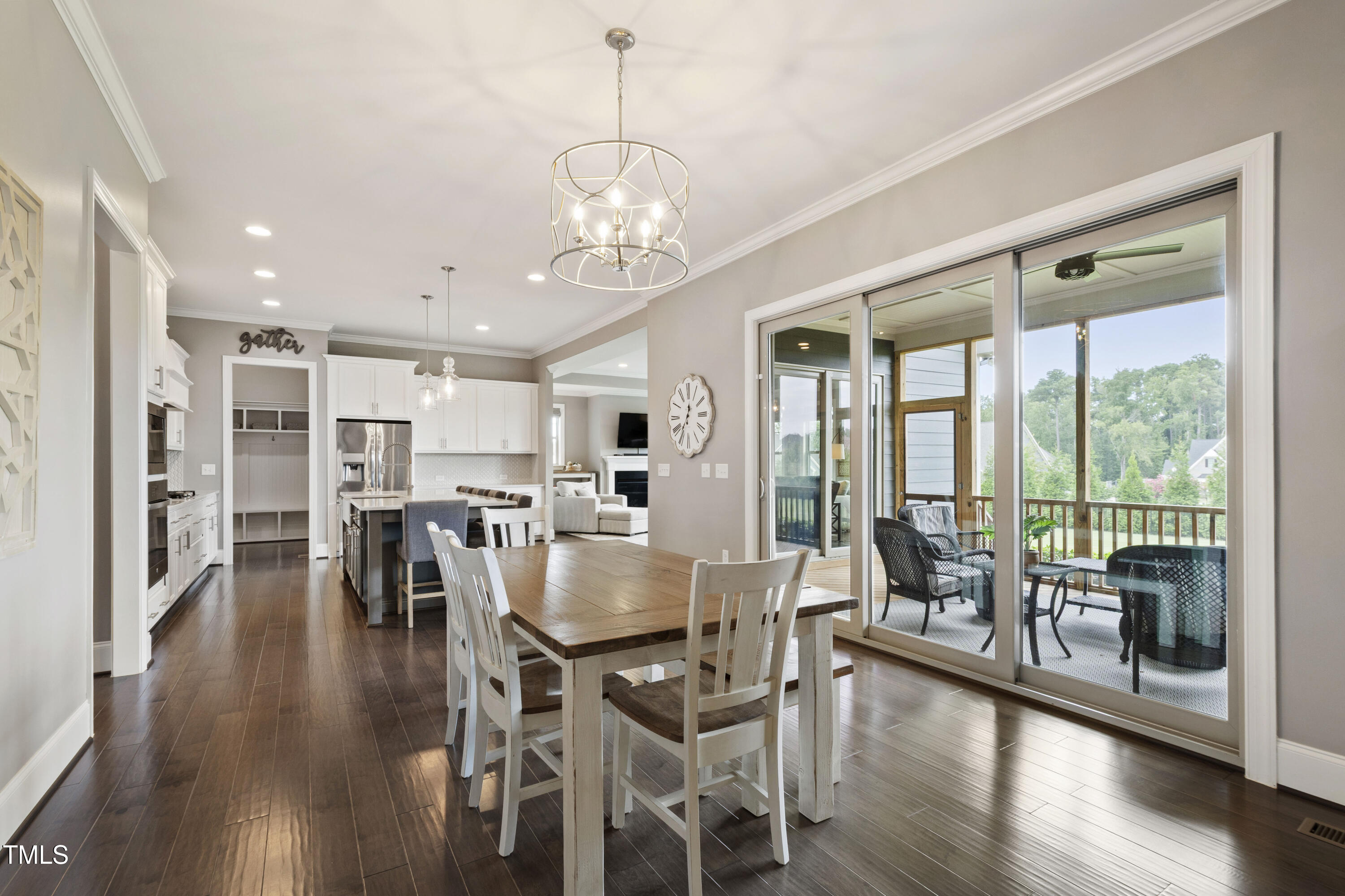 4212 Banks Stone Drive Raleigh, NC 27603 - Photo 36 of 69 a view of a dining room with furniture window and wooden floor