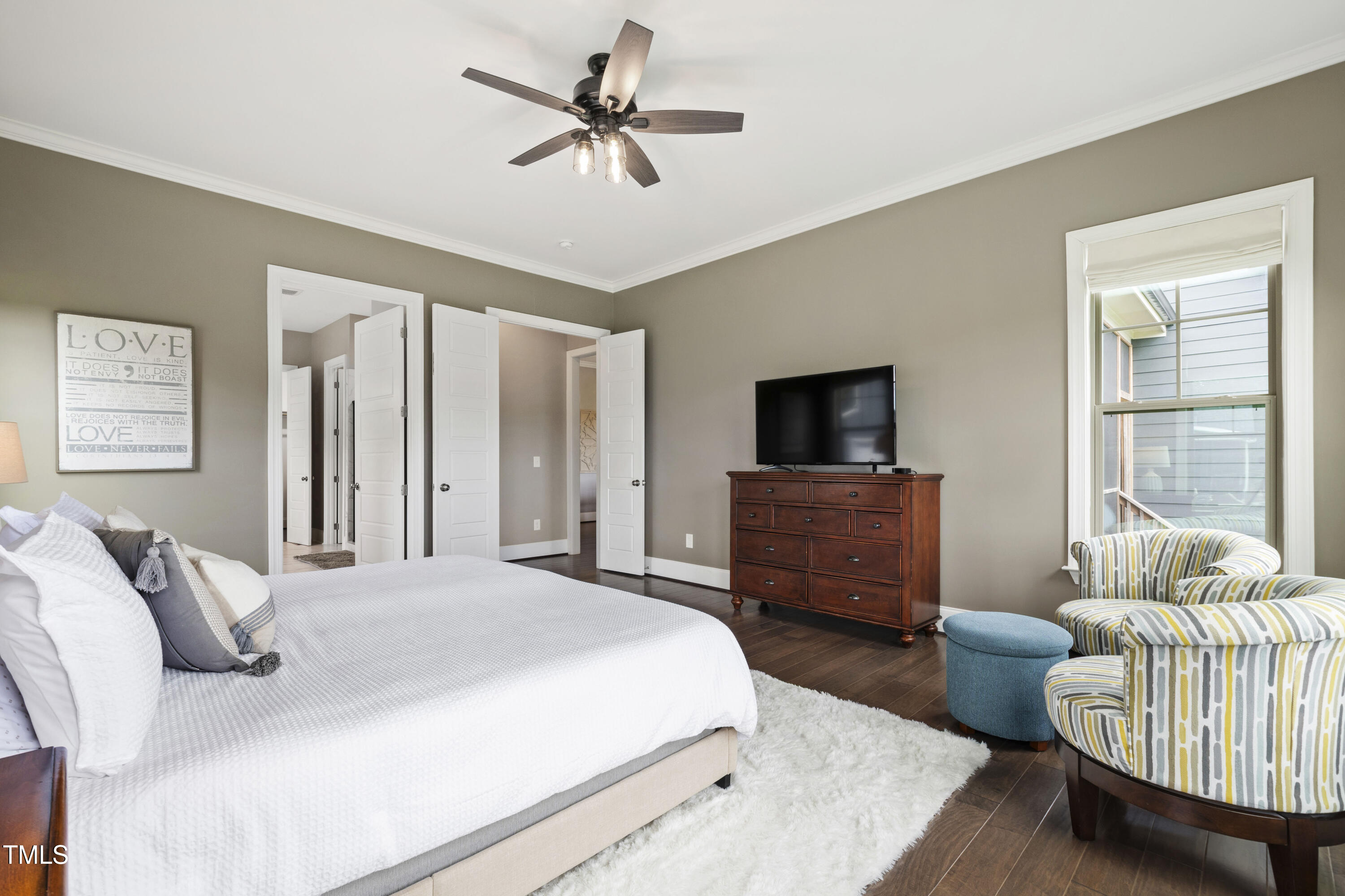 4212 Banks Stone Drive Raleigh, NC 27603 - Photo 37 of 69 a bedroom with a bed and a couch