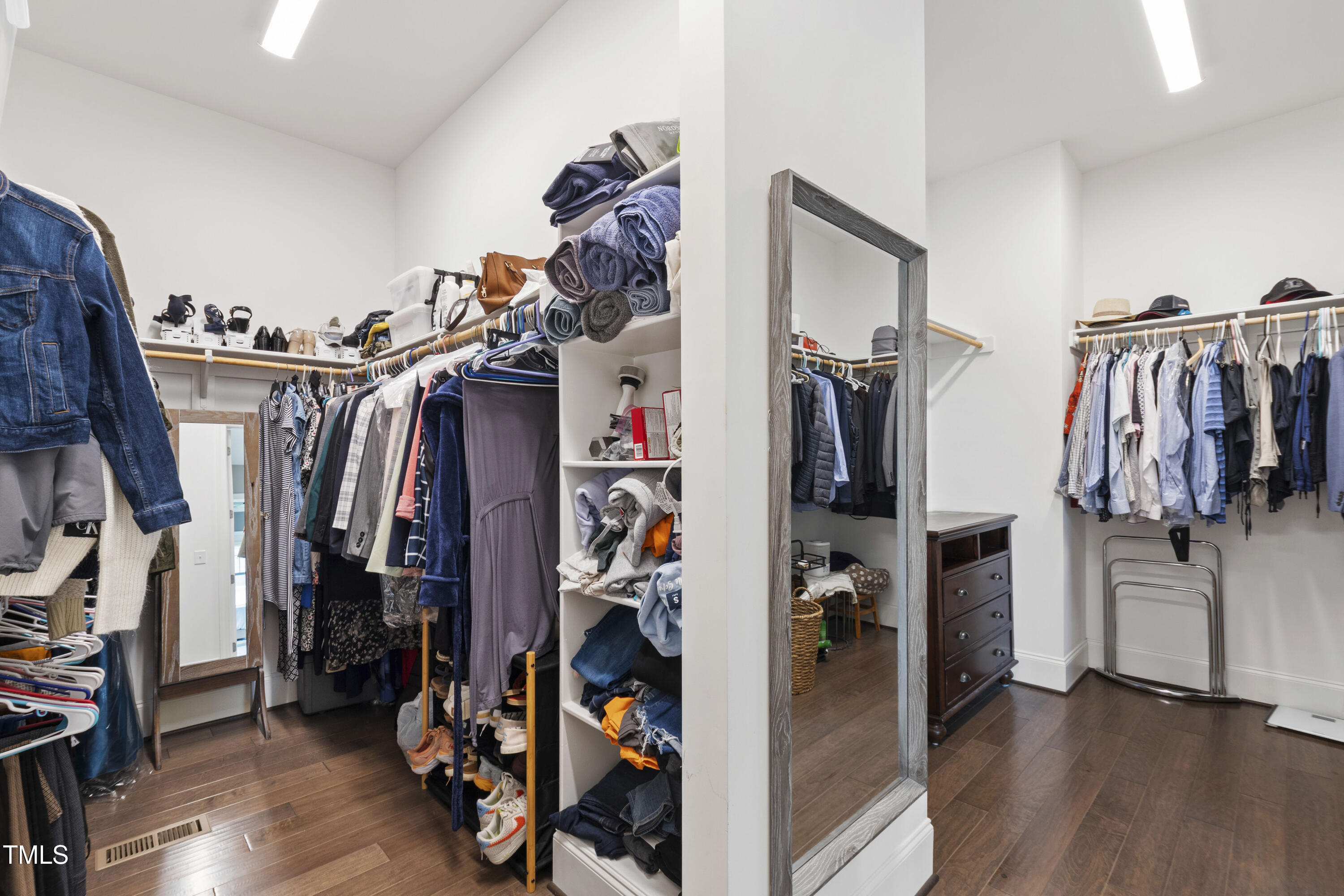 4212 Banks Stone Drive Raleigh, NC 27603 - Photo 41 of 69 a view of walk in closet with clothes and shoes