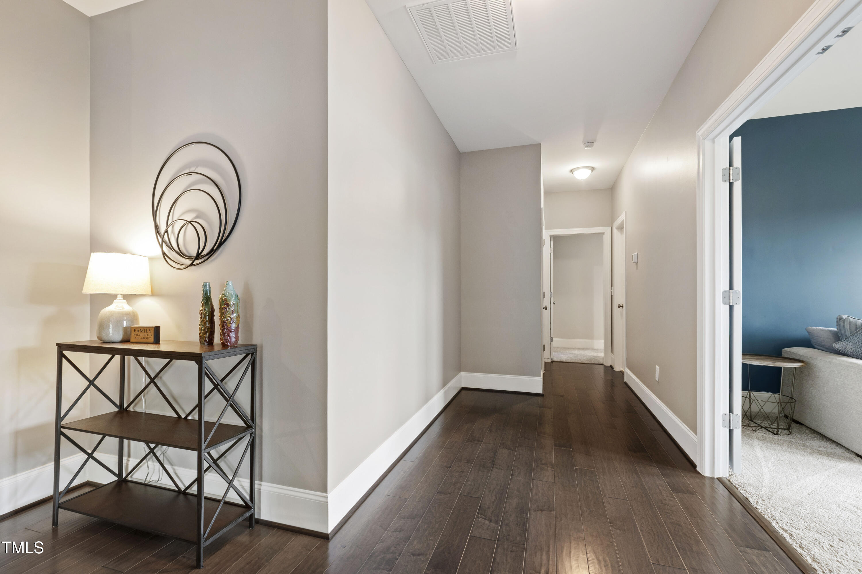 4212 Banks Stone Drive Raleigh, NC 27603 - Photo 50 of 69 a view of room with furniture and wooden floor