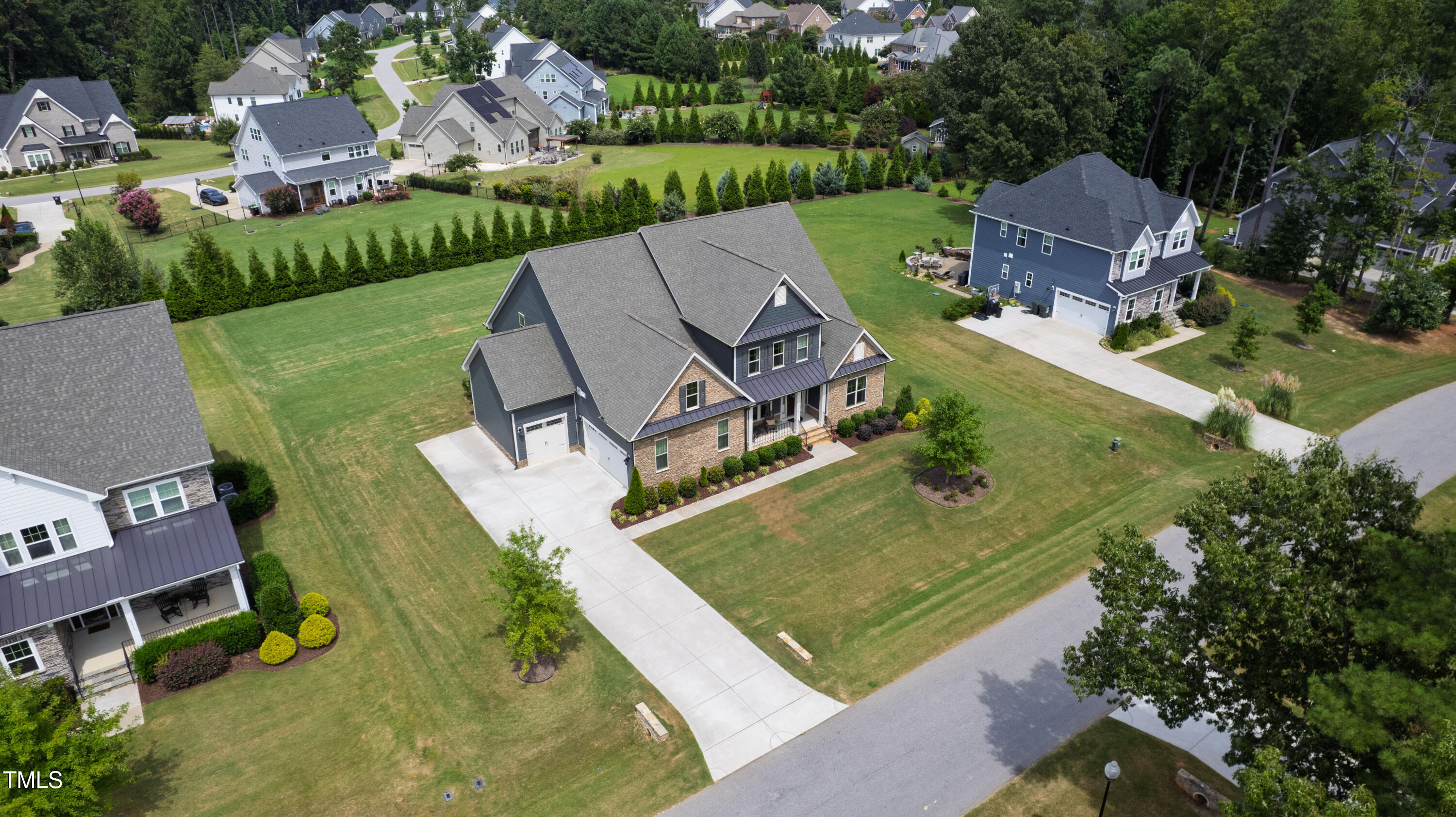 4212 Banks Stone Drive Raleigh, NC 27603 - Photo 59 of 69 an aerial view of a house with garden space and street view