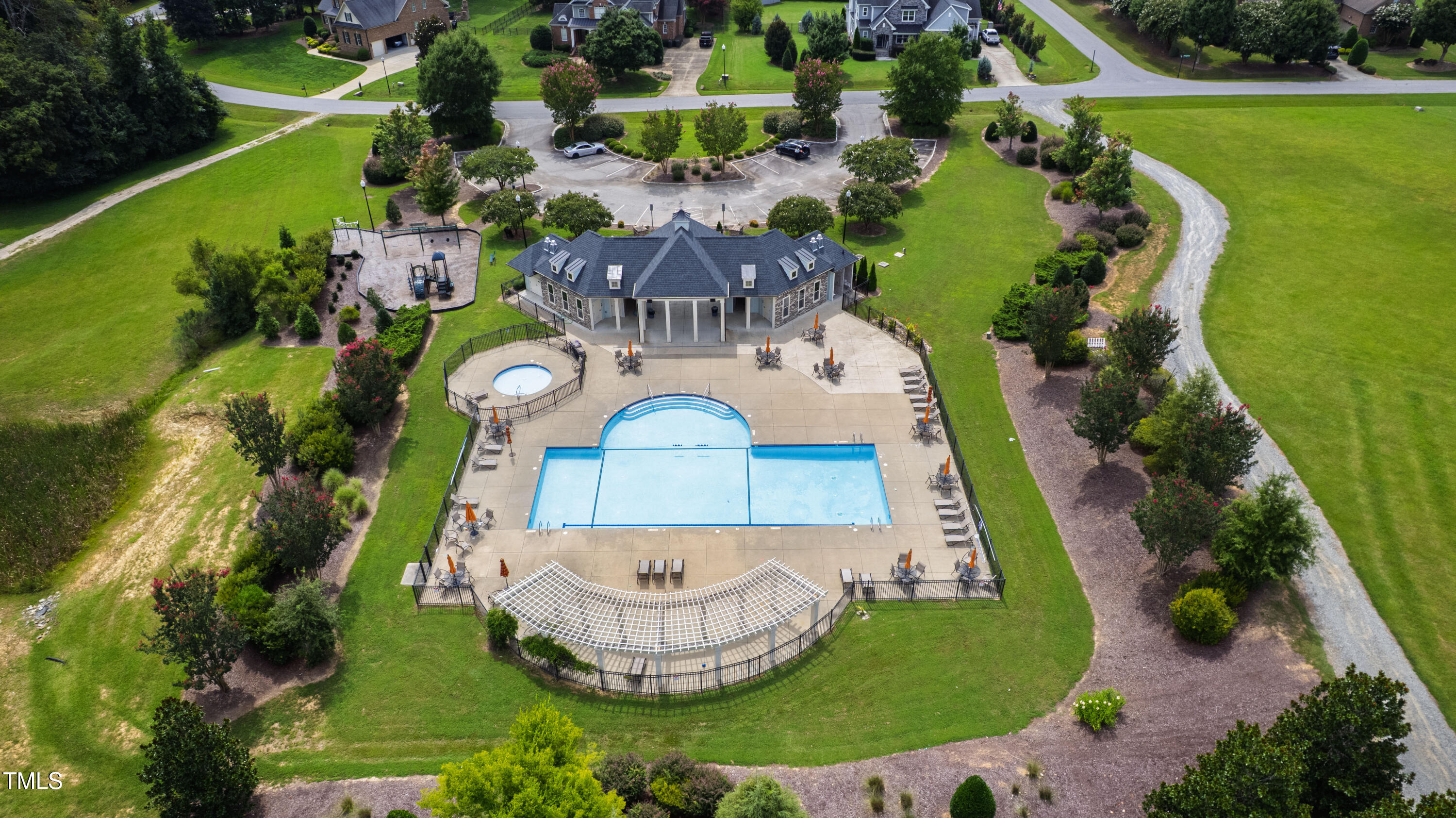 4212 Banks Stone Drive Raleigh, NC 27603 - Photo 67 of 69 an aerial view of house with yard swimming pool and outdoor seating