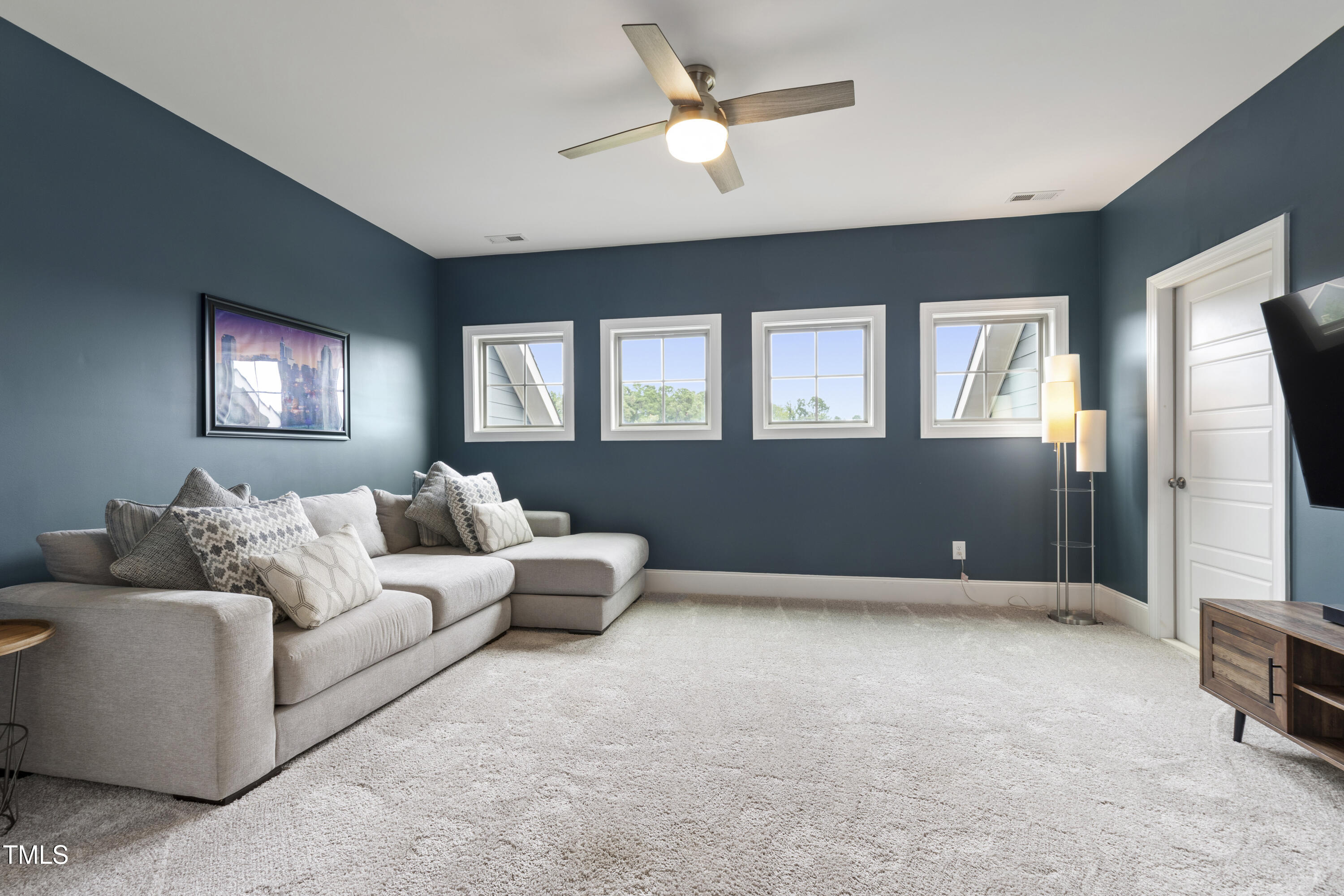 4212 Banks Stone Drive Raleigh, NC 27603 - Photo 7 of 69 a living room with furniture and a window