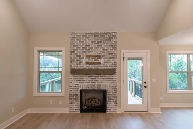 a kitchen with kitchen island stainless steel appliances a sink stove and refrigerator