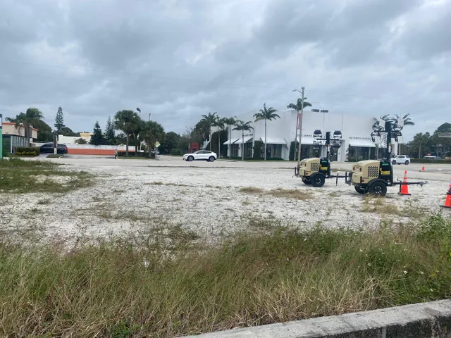a view of yard with car parked