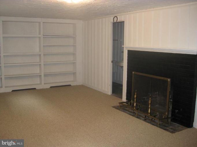 5706 Kenmore Road Baltimore, MD 21210 - Photo 16 of 18 a view of room with empty shelves