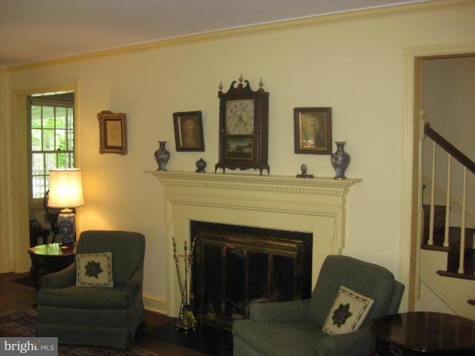 5706 Kenmore Road Baltimore, MD 21210 - Photo 5 of 18 a living room with furniture and a fireplace