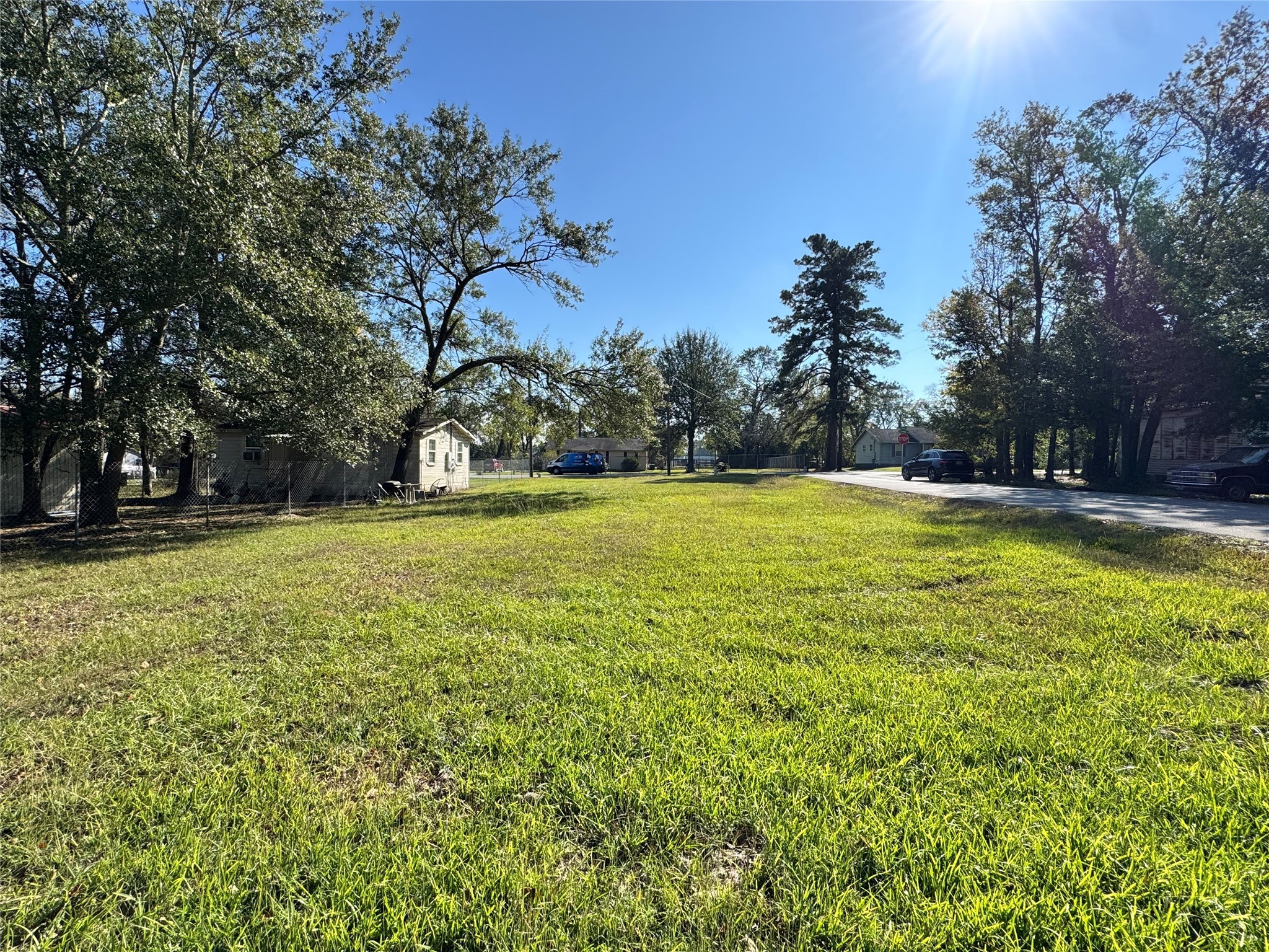 700 College Street Conroe, TX 77301 - Photo 6 of 8 a view of a swimming pool with an outdoor space