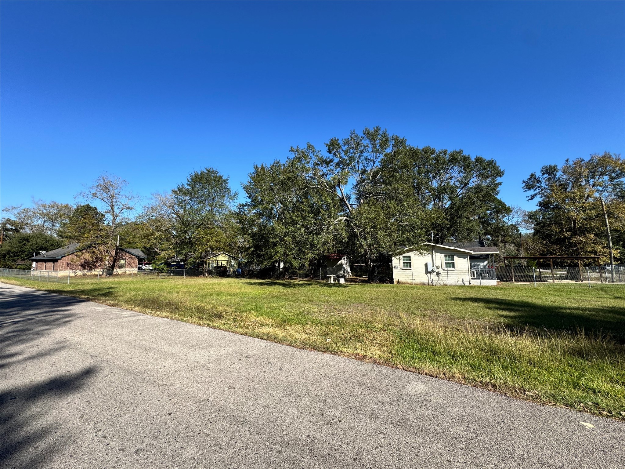 700 College Street Conroe, TX 77301 - Photo 8 of 8 a view of a house with a big yard