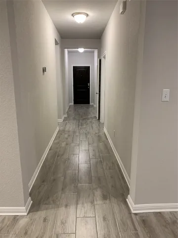 a front view of a house with a glass door