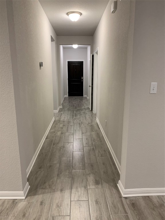 117 Peruvian Lane Georgetown, TX 78626 - Photo 16 of 33 a view of hallway with wooden floor