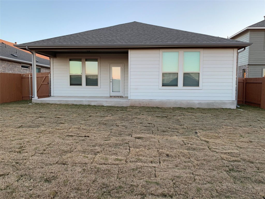 117 Peruvian Lane Georgetown, TX 78626 - Photo 10 of 33 a front view of a house with a yard