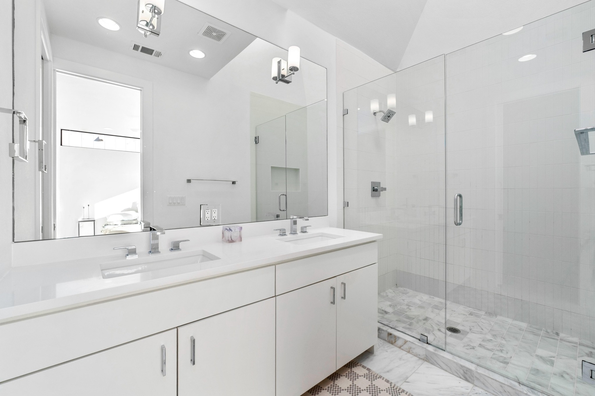 3406 East 17th Street, Unit 4 Austin, TX 78721 - Photo 18 of 32 a bathroom with a shower sink double and mirror