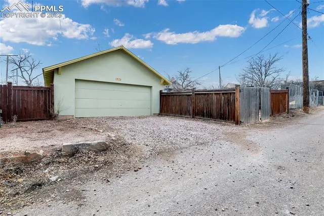 a view of backyard of house