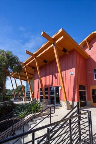 a view of swimming pool with lounge chair