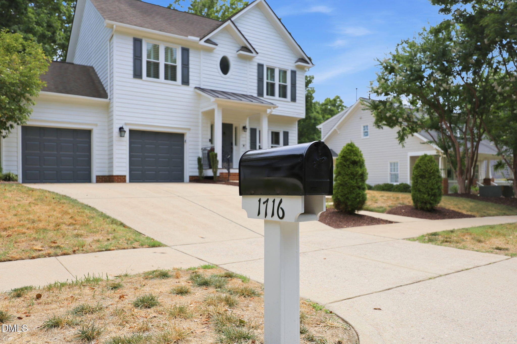1716 Farmington Grove Drive Raleigh, NC 27614 - Photo 1 of 41 a front view of a house with a yard