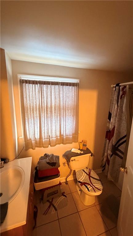 464 Greenridge Road New Kensington, PA 15068 - Photo 12 of 12 a bedroom with furniture and a window