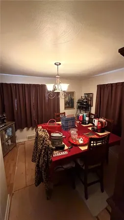 a room with furniture and a chandelier