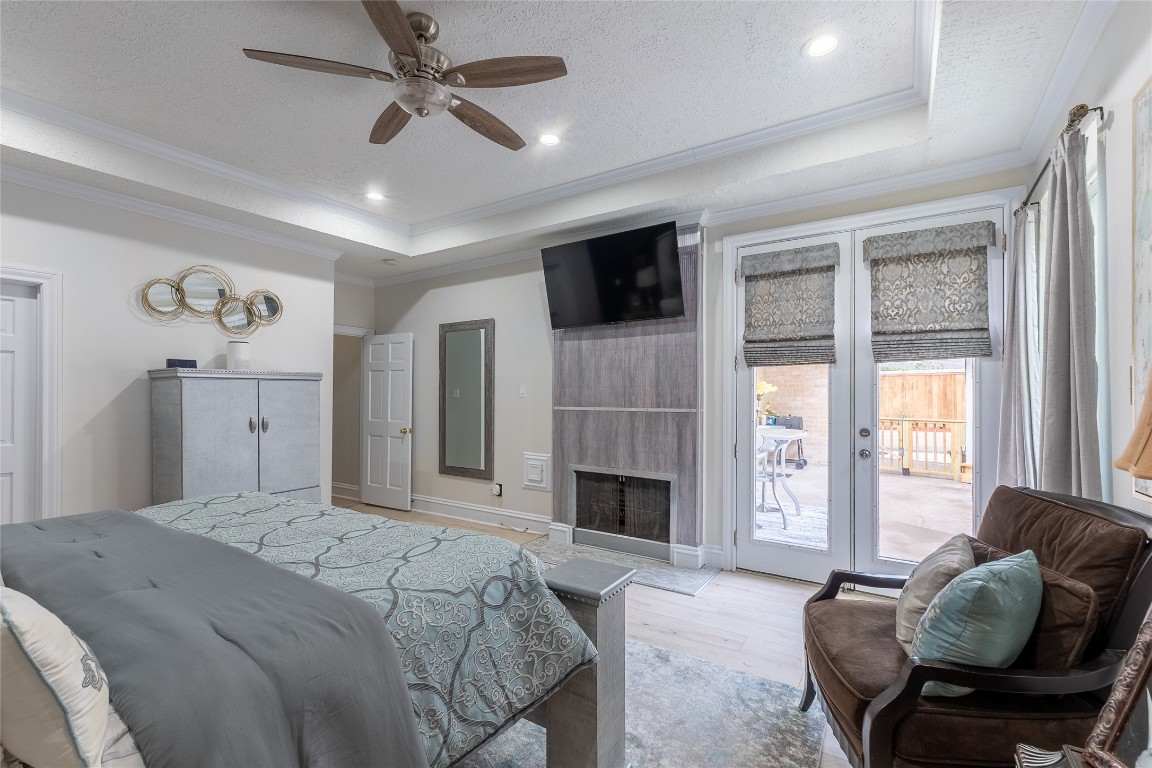 7710 Painton Lane Spring, TX 77389 - Photo 28 of 50 Double pane French doors to patio and 2nd wood burning/gas log fireplace